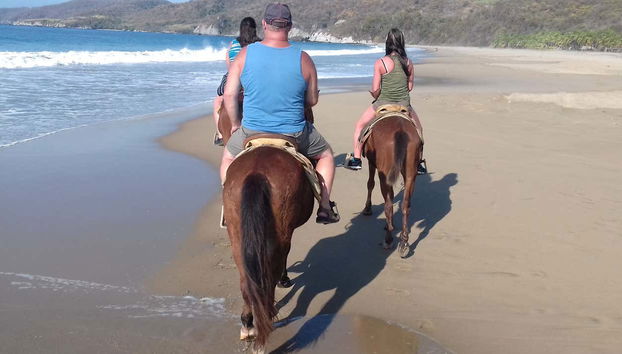 Horseriding on Larga Beach