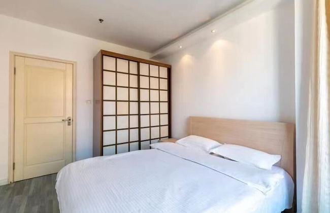 Dalian Xiuzhu Building Apartment - Foto 17