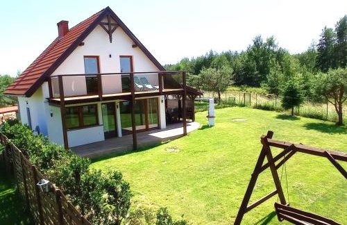 Dom z pięknymi widokami na jezioro ryńskie ilasy. - Foto 3