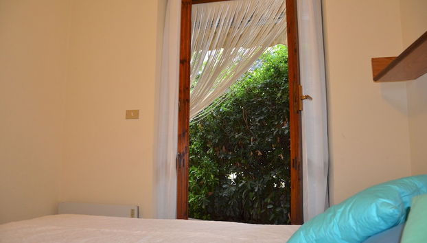 FANTASTIC SARDINIA VILLETTE CON GIARDINO Fronte Mare Fertilia FAHO-GAV01-GAV02 - Photo 3, Chambre