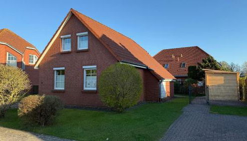 Ferienhaus Maare & Meer mit Sauna Neßmersiel - Foto 3, Garden, Garden view