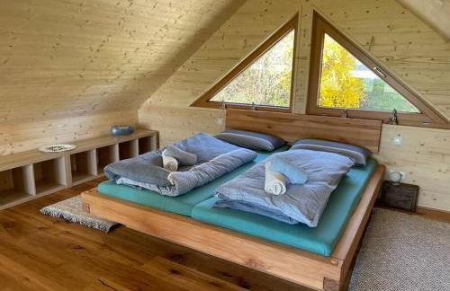 Zweistöckiges Natur-Holzhaus mit Berg- & Seesicht - Foto 7