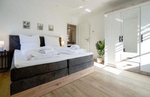 Sonnenterrasse - Helle & moderne Ferienwohnung am Meer - Foto 11