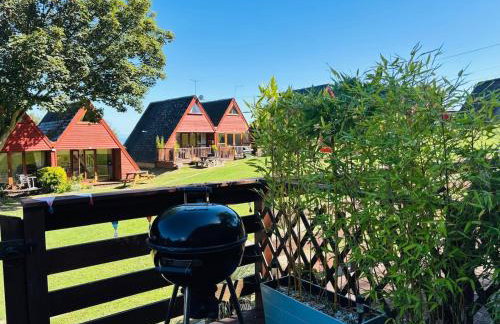 Kingsdowns Top Family Chalet, stunning and cosy interiors, indoor heated pool, mini golf, tennis court, BBQ and beach! - Foto 7