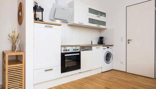 mayhome - das STRANDLOFT schönes Studioapartment mit Balkon, Küche und Tiefgarage - Sauna und Fitness direkt nebenan - Foto 5, stove, dishwasher, pet friendly, toaster