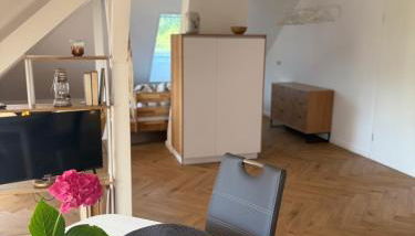 Moderne großzügige Dachgeschosswohnung in Potsdam an den Ravensbergen - Foto 2