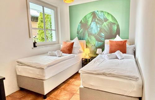 Snug Stays 1 I 3-Zimmer Design Apartment am See mit Garten I Home Office I Highspeed Wifi - Foto 13