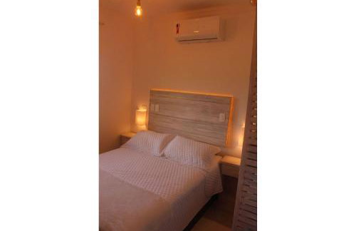 Casa d'Aroeira Residencial Boutique - Centro de Juqueí - Perto de Tudo - 2 quadras do Mar - Serviço de Praia - Roupa de Cama 600 fios algodão Egípcio - Tudo Novo - Estacionamento Interno - Cozinha - Consulte unidades com Ofurô Hidro e Cromoterapia - Foto 68