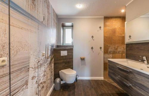 Modernes Holzhaus mit traumhaftem Deichblick - Foto 30