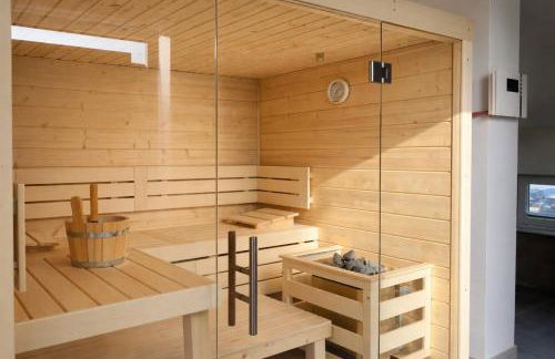 HausLIEBLINGSPLATZ - am Meer - Luxus Villa mit 4 Schlafzimmern, 3 Badezimmern Sauna, Kamin, Weber-Grill und Wallbox - Foto 7