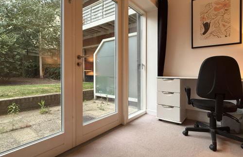 Laura's modern 1 bed apartment in Wimbledon - Foto 12