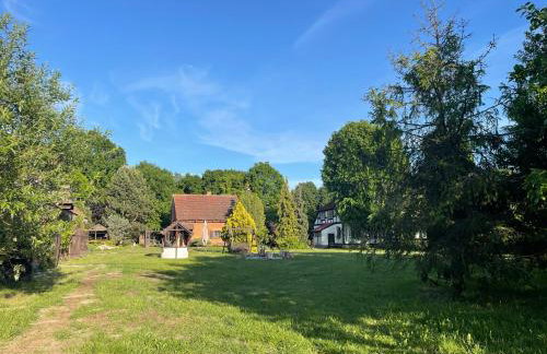 Apartament w XIX-wiecznym Spichlerzu nad Jeziorem z dostępem do parku i widokiem na Dworek Modrzewiowy z 1823 roku - Foto 47