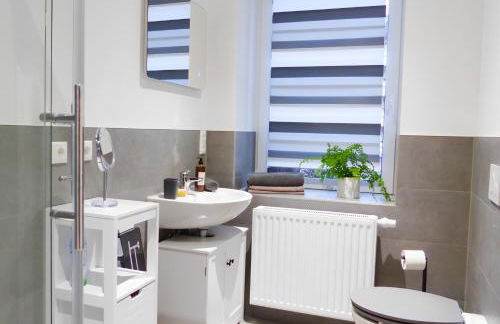 Modernes Apartment mit Queensize-Bett, NETFLIX, Küche, Erdgeschoss, Nähe AMEOS Klinik - Foto 18