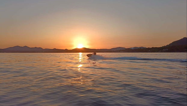 Ride a Jet Ski at sunset