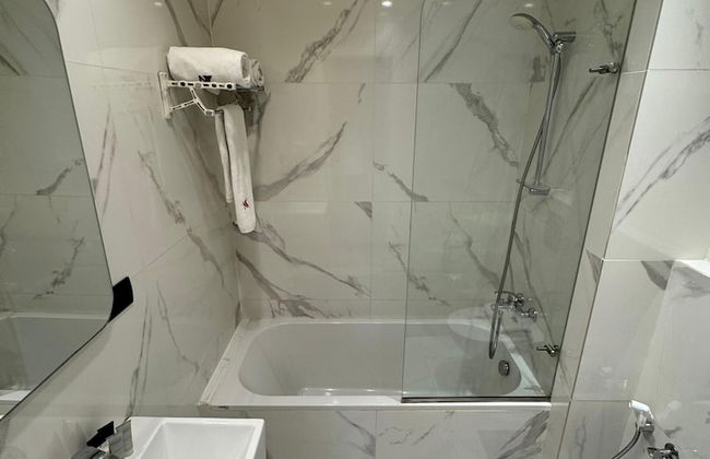 NY Suites Hotel - Photo 52