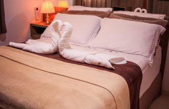 MAIOR NOTA - 2 Quartos com AR CONDICIONADOS SPLIT, Air Fryer, Wi-Fi, Disney Plus, Star Plus, HBO Max, Cadeiras de Praia, Caixa Térmica, Churrasqueira, Rede para Descanso e Chuveirão - 8 pessoas - CONFORTO Máximo - Melhor Localização!! - Photo 2