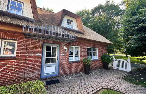 Sky & Sand Homes Strandläufer I Stilvolle Wohnung unter Reet in SPO mit Parkgarten - Photo 43