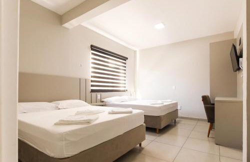 Lou Suítes - Suíte 03 com 2 camas de casal - Conforto para sua Família - Foto 1