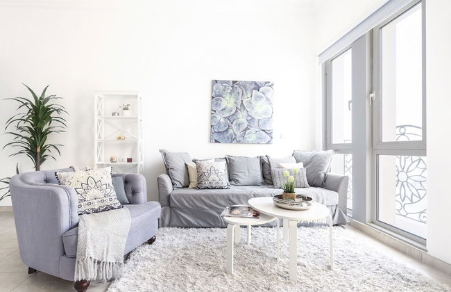 Stylish + Cozy 1BR in Sports City - Photo 1