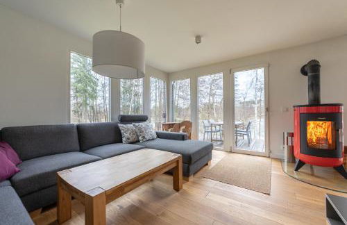 Ferienhaus direkt am See - Kamin, Klima, Sauna und Boot - Foto 28