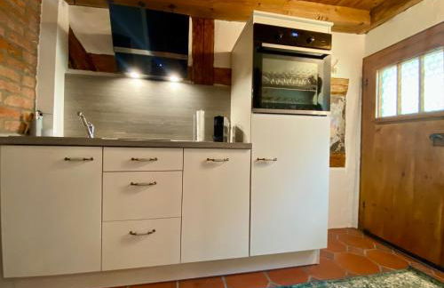 Mein MINI-HAUS - 2 Zimmer - Smart-TV - Stein & Holz - Foto 13