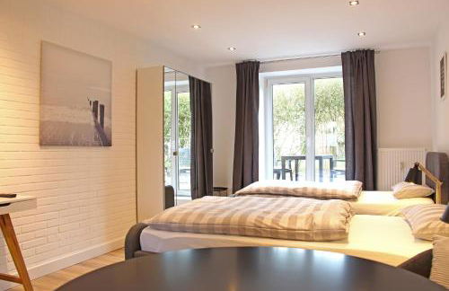 Moderne 1-Zimmer Wohnung mit Terasse, Küche, Bad mit Dusche, TV & WIFI - Photo 6