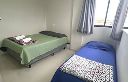 03 quartos (ar condicionado e ventilador), até 10 pessoas, garagem, atrás do hospital da Unimed apt 202 - Foto 4