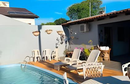 Casa com 2 suites e 1quarto piscina Ar para 8 hospedes - Foto 1