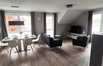moderne Neubau-Wohnung mit Kamin und 35qm Dachterrasse - Foto 6