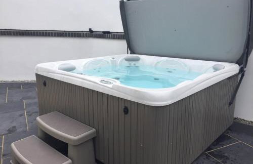 Relax in style at my stunning Holywell Beach home - Foto 10