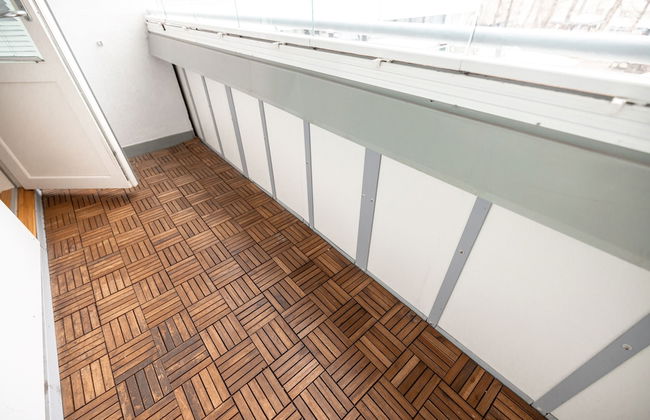 2ndhomes Cozy 1BR Apartment with Balcony - Photo 12