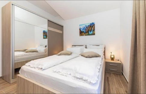 Apartmani Kornelija - Photo 33
