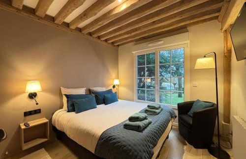 Chant des mouettes Maison rénovée spacieuse tout confort grand jardin belle terrasse aménagée parking 8 personnes 4 sdb 5 wc à 10 mn à pied de la mer Port en Bessin tous commerces restaurants proche Omaha Beach - Photo 14