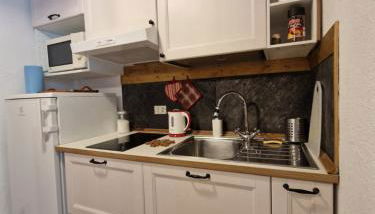 L'Atelier du Temps - Treinadan Appartement - Foto 4, stove, minibar