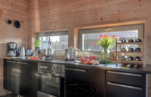 traumHaff Küstenchalets - einzigartige Chalets an der Ostsee. Ganz aus Lärchenholz mit Kamin und Sauna - Foto 13