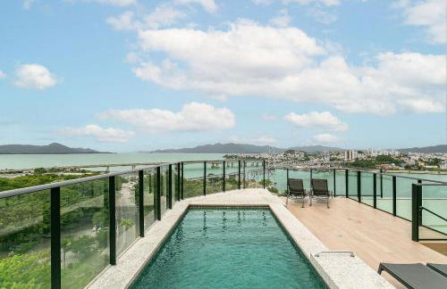 The Bridge by Viva - Prédio com piscina no terraço e academia em Floripa - Photo 3