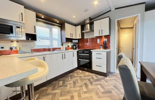 Stewarts Resort Lodge 32 - Foto 1