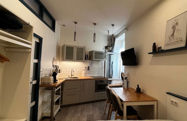 MRTN APARTMENTS & SUITES - Photo 8