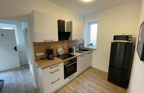 FEDDERSEN LIVING Kernsanierte Ferienwohnungen - Gemütlich - Netflix - Voll ausgestattet - zentral - Foto 43