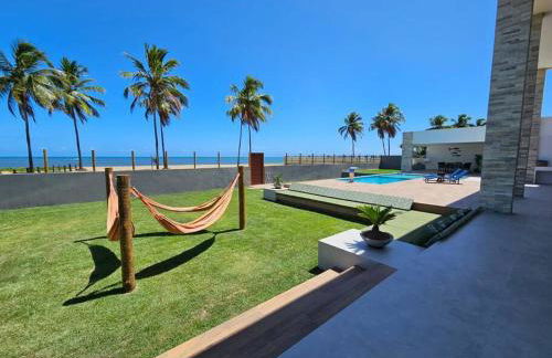 Piscina aquecida, 5 suítes e pé na areia com vista espetacular!! - Photo 14