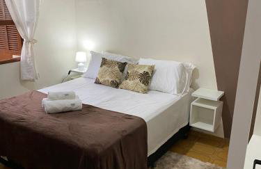 Casa aconchegante à 400m da Praia da Tartaruga - Ar condicionado - WIFI 450MB - Netflix - Cozinha Completa - Garagem - Foto 12