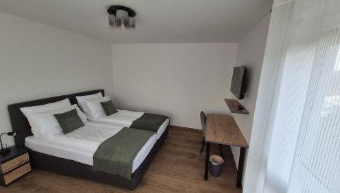 Doppel-Zweibettzimmer mit Küche und großem Wintergarten - Foto 4