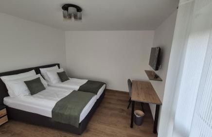 Doppel-Zweibettzimmer mit Küche und großem Wintergarten - Foto 4