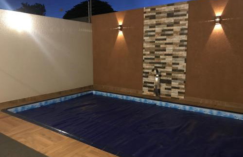 Sobrado casa de alto padrão, ar condicionado em todos os cômodos, aquecimento à gás, com piscina aquecida e área de festas - para o Show Rural 2026, fácil acesso a Rodovia 277 - Foto 16