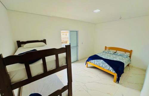 Casa em Itanhaém praia pé na areia - Photo 7