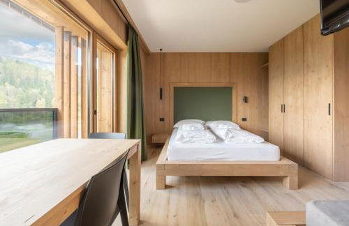 Ama Dolomiti - Residence - Photo 25