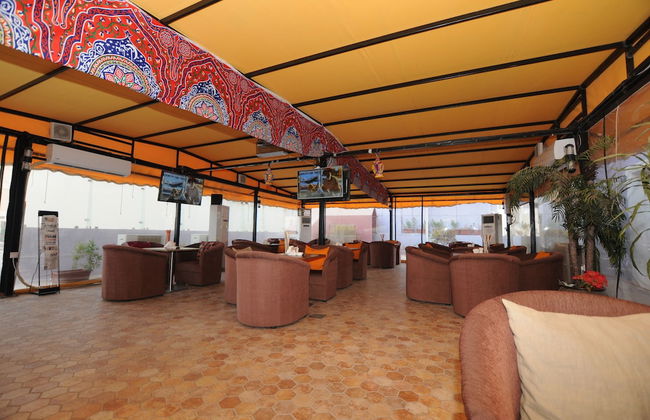 Al Muhanna Plaza Hotel - Photo 36