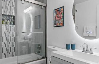 Stylish 2BR Dual-Kitchen Retreat Near Forest Park - Photo 35