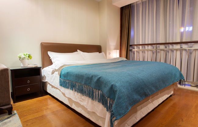 Qingdao Jinshan We Holiday Apt Wusi - Photo 24