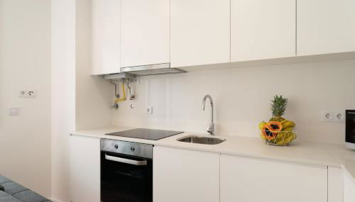 HostWise Cozy Studio with Balcony and Garage - Photo 4, stove, pet friendly